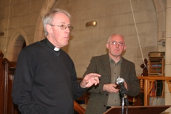 Rev Ron Elsdon prepares to take questions for lecturer Rev Patrick McGlinchy (rear).